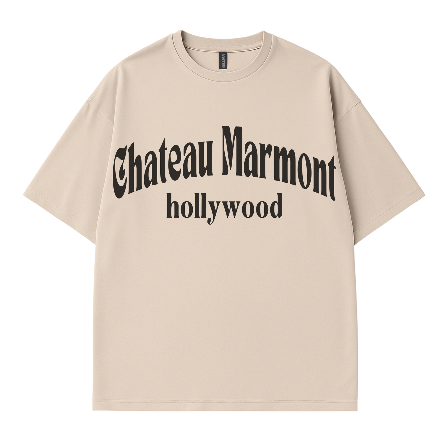 Woman Trendy t-shirt with “Chateau Marmont Hollywood” text in arched retro font. Soft cotton shirt laid flat on a concrete background
