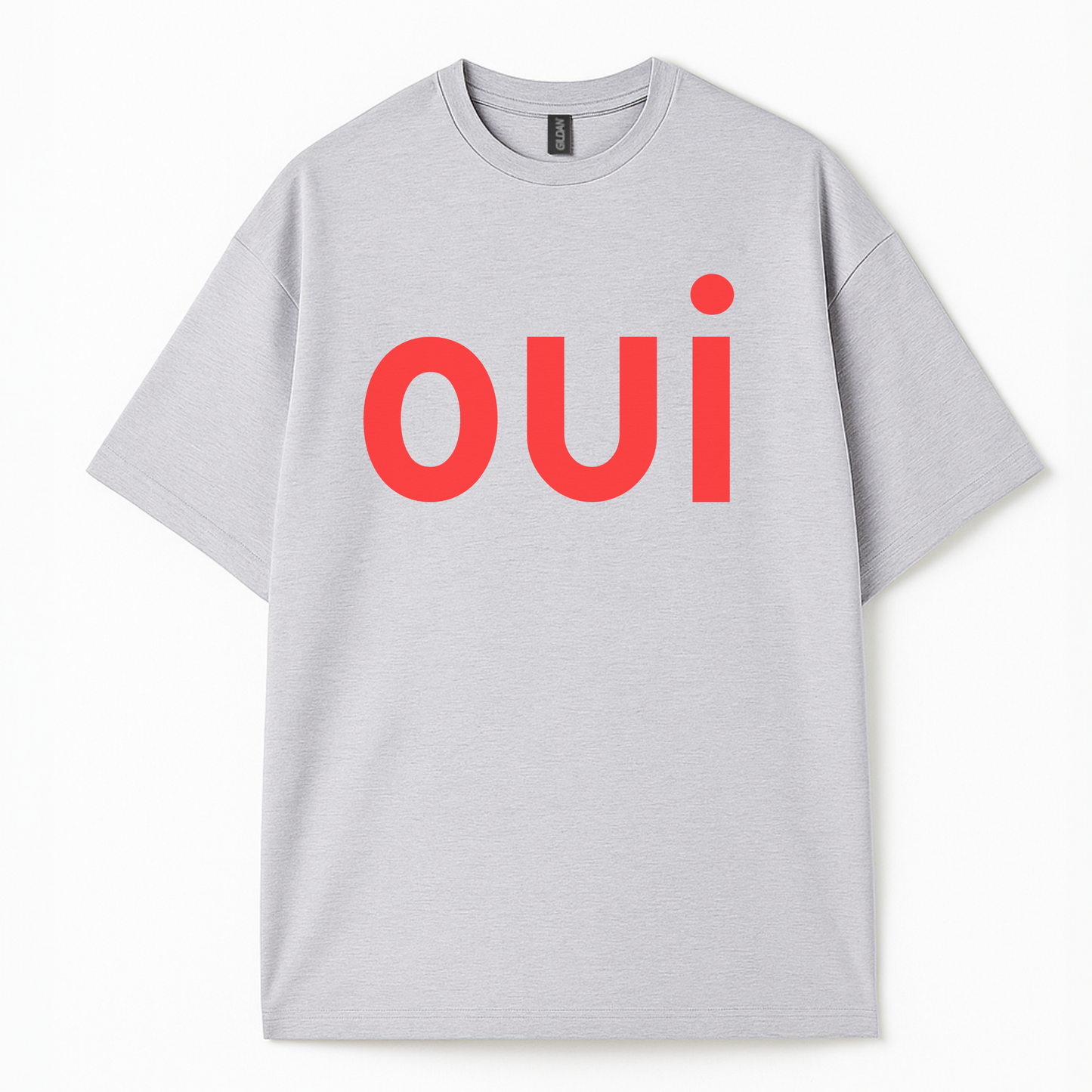 Lifestyle shot of Côte Crew’s “oui” tee paired with casual streetwear for a modern, French minimalist outfit.