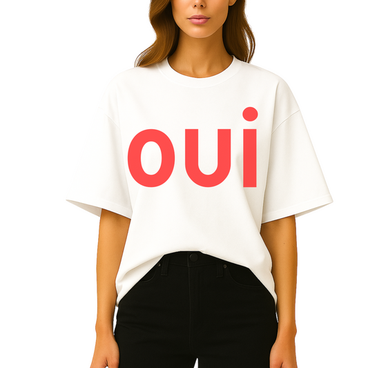 Close-up of the red “oui” print on black soft cotton t-shirt from Côte Crew, showing clean typography and contrast