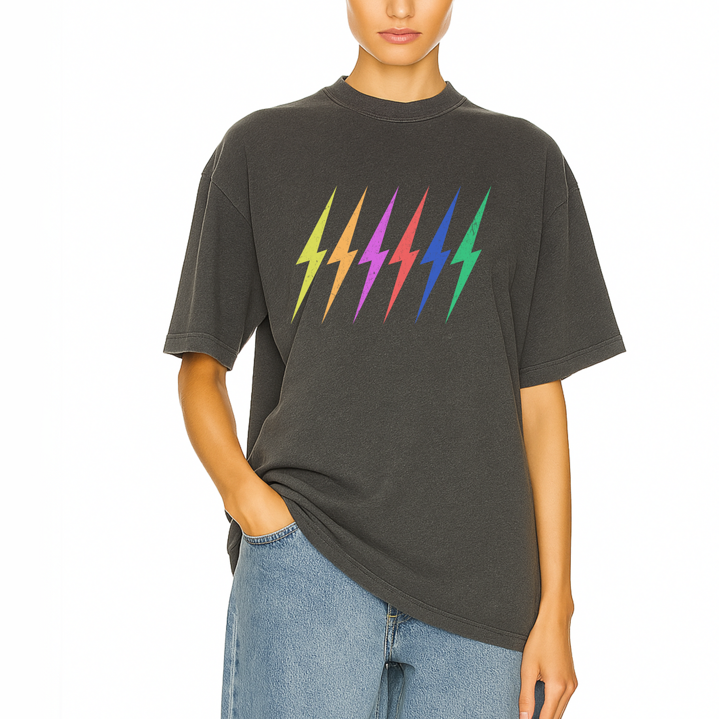 Lifestyle image of Côte Crew’s rainbow lightning bolt graphic tee styled casually for vibrant everyday wear