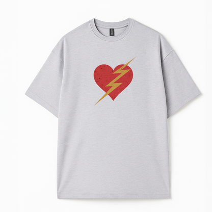 Woman trendy t-shirt with a bold red heart and yellow lightning bolt graphic. Retro-inspired pop art design Woman trendy t-shirt with a bold red heart and yellow lightning bolt graphic. Retro-inspired pop art design 