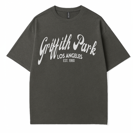 Griffith Park Los Angeles graphic t-shirt for women by Côte Crew, featuring bold white text on a soft charcoal cotton tee, established 1990 design